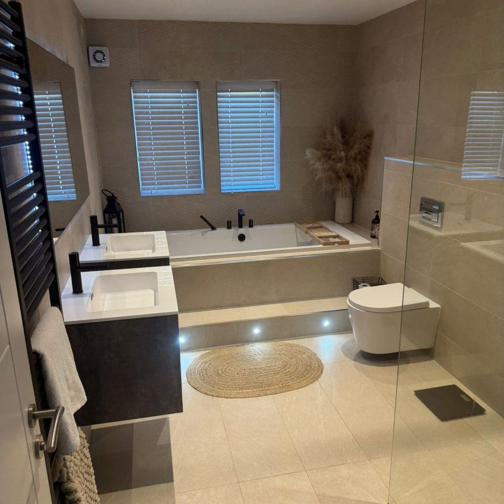 Bathroom renovation in leeds -with-Large-tiles-bath-and-walk-in-shower